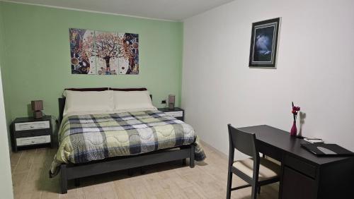 Кровать или кровати в номере Al BORGO costermano sul garda via pertica 8A