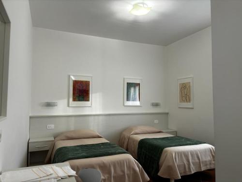 Postel nebo postele na pokoji v ubytování La Nuova Dimora B&B