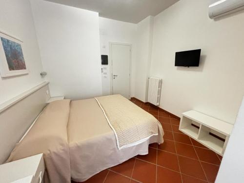 Postel nebo postele na pokoji v ubytování La Nuova Dimora B&B