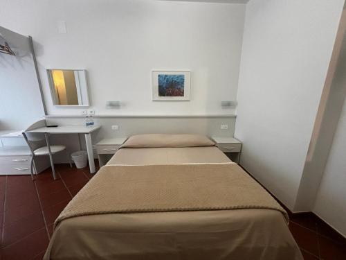 Postel nebo postele na pokoji v ubytování La Nuova Dimora B&B