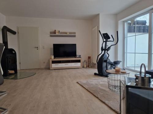 a large living room with a flat screen tv at -NEUE- Ferienwohnung - Monteurwohnung in Lippe in Lage