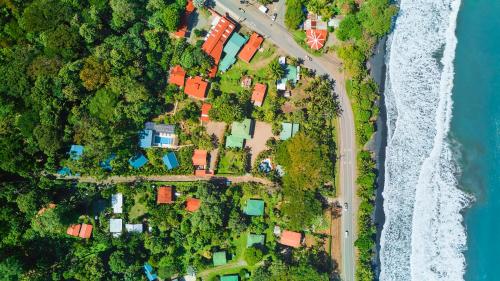 an overhead view of a beach with houses and the ocean at Casa Kristel - Exquisite Villa Getaway in Puerto Viejo