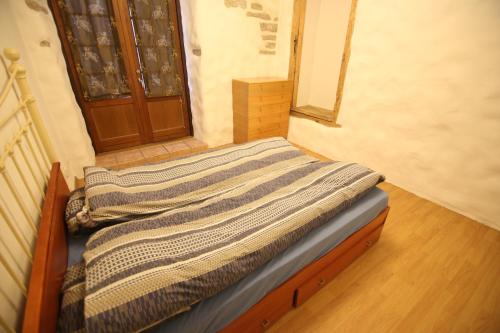 Postel nebo postele na pokoji v ubytování Viru Old Town Apartment