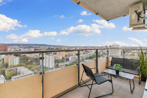 a balcony with a view of a city at LAM City Jungle - SKY VIEW 21 FLOOR - Free Parking in Bratislava