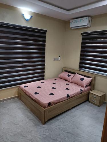 Ένα ή περισσότερα κρεβάτια σε δωμάτιο στο Madoza Apartment - Mowe