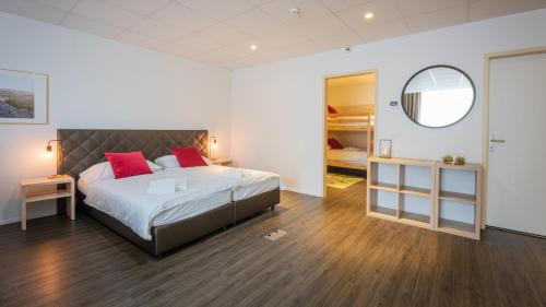 Los Lorentes Hotel Bern Airportにあるベッド
