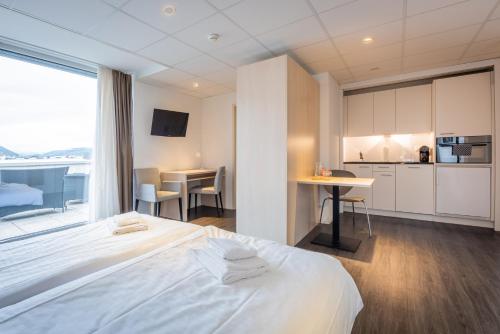 Los Lorentes Hotel Bern Airportにあるベッド