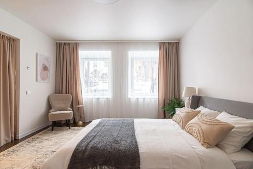 Cama ou camas em um quarto em Stylish & Cozy Uzupis Apartment by URBAN RENT