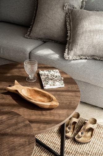 a living room with a coffee table and a couch at Cofresi Hills Residence in Gurapito