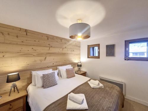 Postel nebo postele na pokoji v ubytování La Bruyere - appartement - 6pers