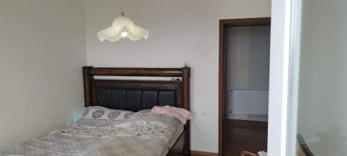 Ein Bett oder Betten in einem Zimmer der Unterkunft LT property