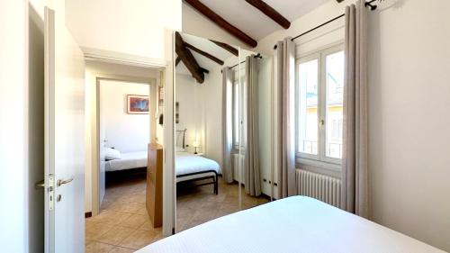 Katil atau katil-katil dalam bilik di Int 4 - Suite Edoardo by Residence San Luca