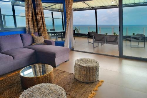 Posezení v ubytování Hôtel Villa Les Orchidées
