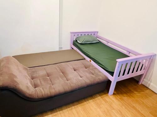 a bunk bed with a mattress and a bed frame at One Bedroom Flat/Apartment. in Bexleyheath
