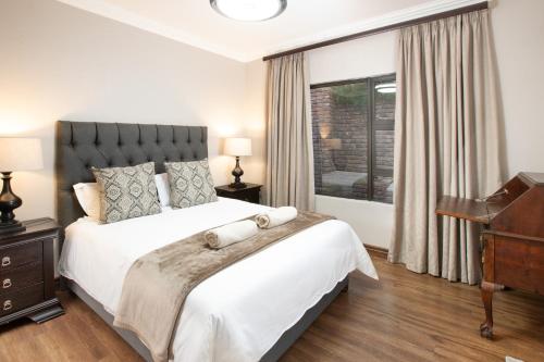 Postel nebo postele na pokoji v ubytování Guesthouse Fort Knox