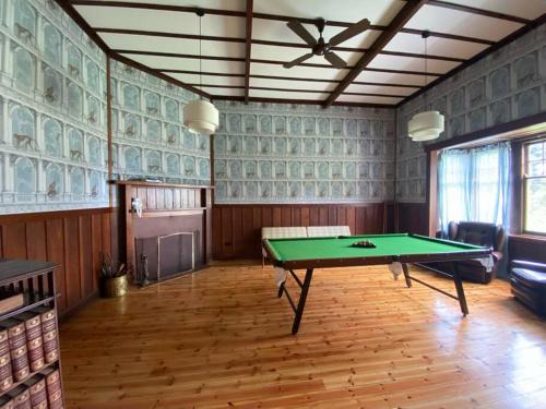 a room with a ping pong table in it at McIntyre homestead in Penshurst