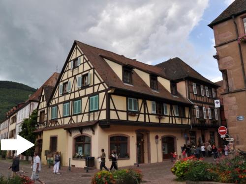 a large building with people standing outside of it at Origin'alsace in Kaysersberg