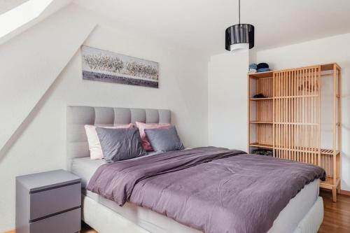 Katil atau katil-katil dalam bilik di Charmante Wohnung an beliebter, urbaner Lage
