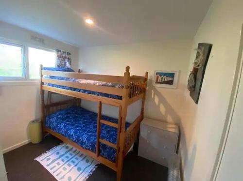 a bedroom with two bunk beds in a room at Cosy Cornish Chalet Camelford Port Isaac in Camelford