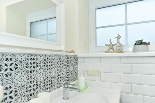 Ένα μπάνιο στο Ferienhaus Frieda