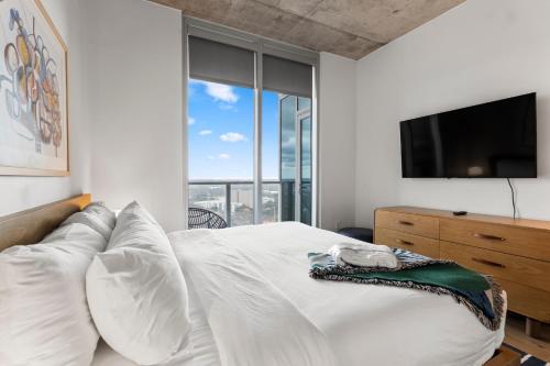 TV a/nebo společenská místnost v ubytování Austin Condo Hotel