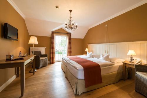Postel nebo postele na pokoji v ubytování Hotel Eifelland