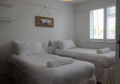 Postel nebo postele na pokoji v ubytování Modern & Stylish House with Garden Nearby Beaches & Chichester