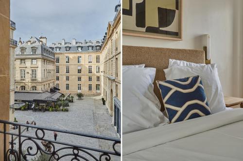 - un lit sur un balcon avec vue sur un bâtiment dans l'établissement Residence Louvre/Palais Royal by Studioprestige, à Paris