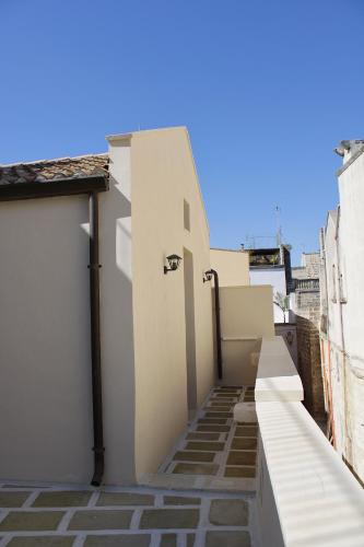 a stairway leading up to a white building at Casa Brumar in Nardò