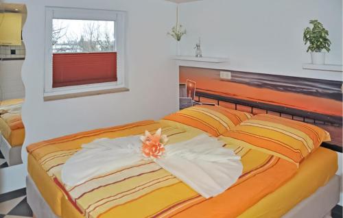 A bed or beds in a room at Gorgeous Home In Wolgast With Kitchen