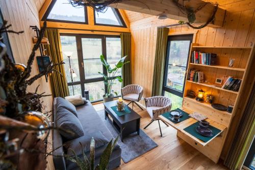an overhead view of a living room in a tree house at Taunus Tinyhouse in Weilrod