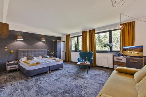 Ένα ή περισσότερα κρεβάτια σε δωμάτιο στο Hotel Zerrenpach Látky