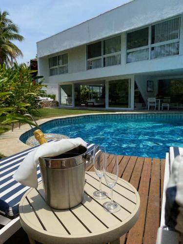 Бассейн в Guest House Guarujá Hotel Boutique или поблизости