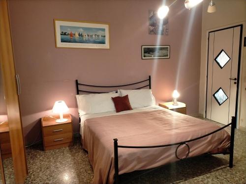 Sleep In Sicily tesisinde bir odada yatak veya yataklar
