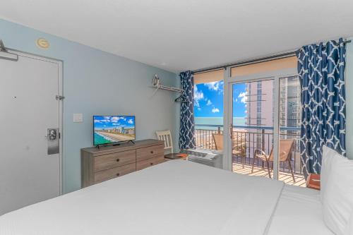 Krevet ili kreveti u jedinici u objektu Newly Renovated King Suite-Ocean Views! Boardwalk 1140