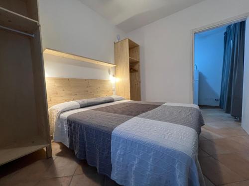 Ένα ή περισσότερα κρεβάτια σε δωμάτιο στο Agriturismo Paradisa