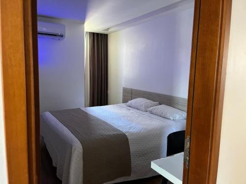 Ένα ή περισσότερα κρεβάτια σε δωμάτιο στο Mcz Hotel