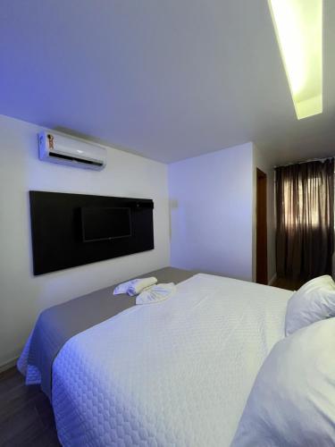 Ένα ή περισσότερα κρεβάτια σε δωμάτιο στο Mcz Hotel