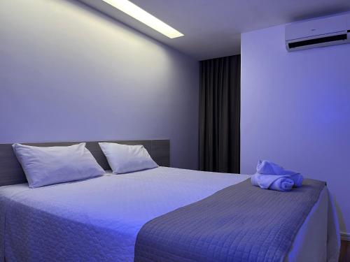 Ένα ή περισσότερα κρεβάτια σε δωμάτιο στο Mcz Hotel