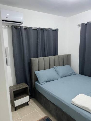 Säng eller sängar i ett rum på Lujo Urbano: Vive la Ciudad