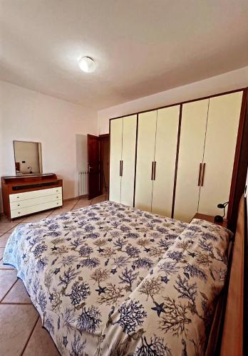 Katil atau katil-katil dalam bilik di Case Vacanze Le Buganville