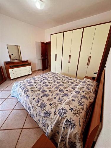 Katil atau katil-katil dalam bilik di Case Vacanze Le Buganville
