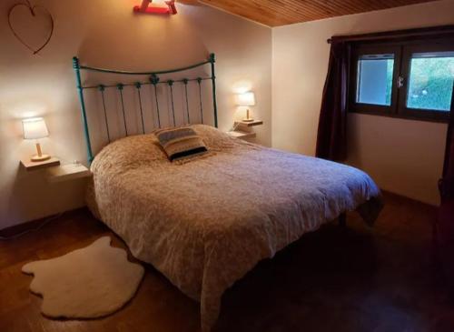 Ένα ή περισσότερα κρεβάτια σε δωμάτιο στο La Maisonnette, Vesc