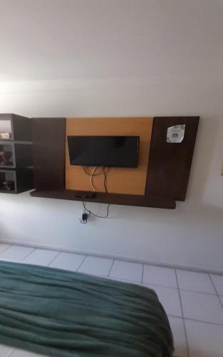 Μια τηλεόραση ή/και κέντρο ψυχαγωγίας στο Sonia Flats Natal - No Apart Hotel Ponta Negra Beach