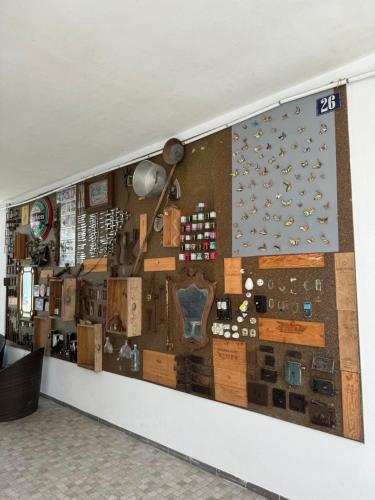 a wall with a display of different types of electronics at Cube30 Águeda - Alojamento Local 1 in Águeda
