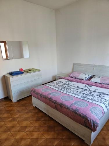 Кровать или кровати в номере Intero appartamento economico!