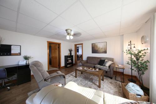 a living room with a couch and a table at Wayfarer Inn in Dalton