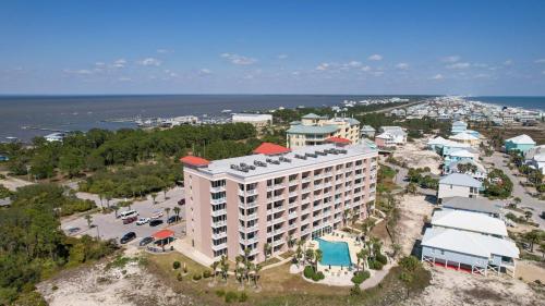 an aerial view of a hotel on the beach at Gulf Shores Condo with Balcony 2 Mi to Fort Morgan! in Gulf Shores