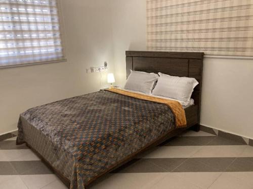 A bed or beds in a room at Villa Nova Lodge