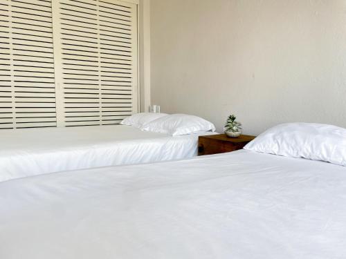 Ein Bett oder Betten in einem Zimmer der Unterkunft Siete Mares